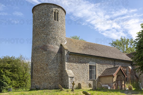 Church of Saint Peter, Bruisyard, Suffolk, England, UK round tower and churchyard