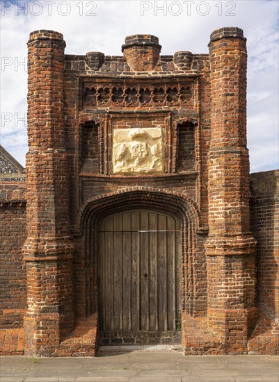 Red brick Tudor gateway Wolsey's Gate, Ipswich, Suffolk, England, UK, Cardinal Thomas Wolsey 1530s