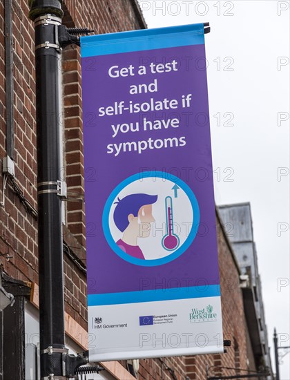 Get a test and self-isolate if you have symptoms Covid 19 information poster, Newbury, Berkshire, England, UK