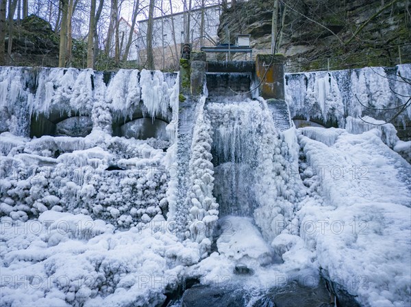 The Niezelgrund hydroelectric power plant power station is a listed small hydroelectric power station in Saxony and is located between Porschendorf and Lohmen on the Wesenitz. In severe frost, the site is transformed into a bizarre ice landscape, Lohmen, Saxony, Germany, Europe