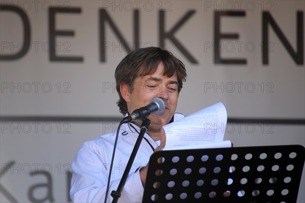 Karlsruhe: Michael Ballweg speaks at the Corona protests against the measures taken by the federal government. The protests were organised by the Querdenken 721 Karlsruhe initiative