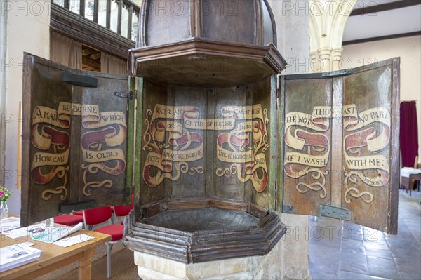 Opened up 17th Century wooden font cover church of Saint Mary, Boxford, Suffolk, England, UK