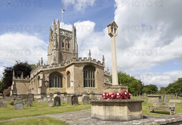 Cotswolds historic stone building churchyard of Church of Saint Mary, Fairford, Gloucestershire, England, UK