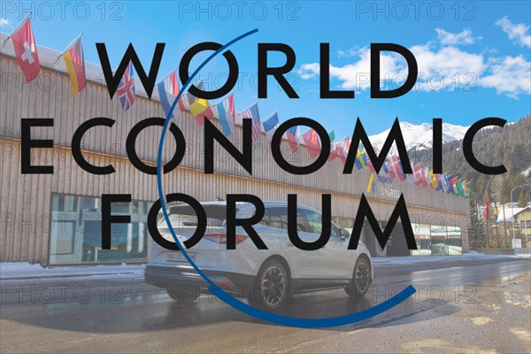 Logo of the WEF (World Economic Forum), in the background the Davos Congress Centre