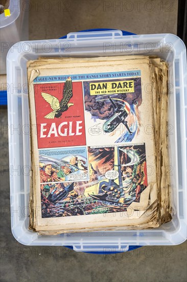 Vintage Eagle comics with Dan Dare cartoon story on display in house clearance auction sale room, UK