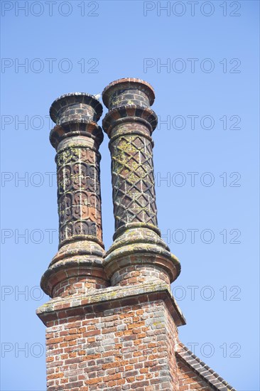 Historic Moot Hall building town guildhall, Aldeburgh, Suffolk, England, UK 16th century Tudor architecture detail of chimneys