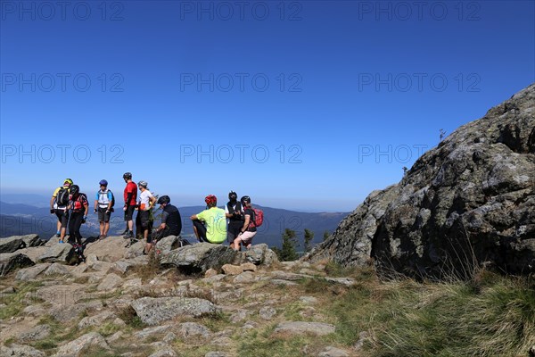 Mountain bike tour through the Bavarian Forest with the DAV Summit Club: On the summit of the Grosser Arber 1, 456 metres above sea level