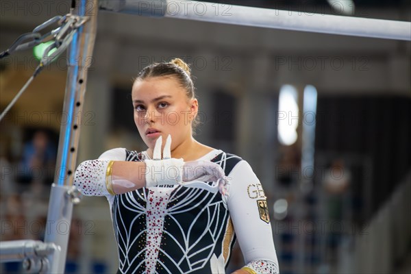 Heidelberg, 9 September 2023: Women's apparatus gymnastics national competition in the SNP Dome in Heidelberg. Emma Malewski in front of her routine on the uneven bars