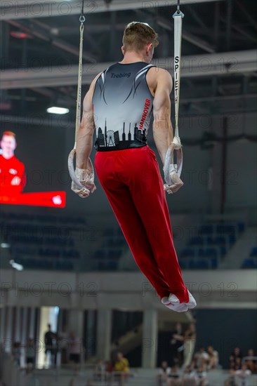 Heidelberg, 9 September 2023: Men's World Championship qualification in conjunction with a national competition against Israel. Glenn Trebing during his routine on the rings