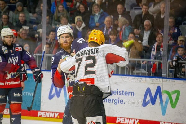 Adler Mannheim v Fischtown Pinguins Bremerhaven (PENNY DEL, German Ice Hockey League) : Fistfight between Korbinian Holzer and Phillip Bruggisser