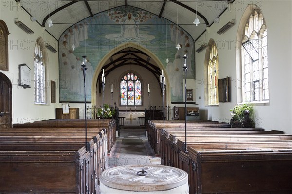 Painting above the chancel arch depicting a scene from the Apocalypse, probably late Victorian in the church at Stanton St Bernard, Wiltshire, England, UK