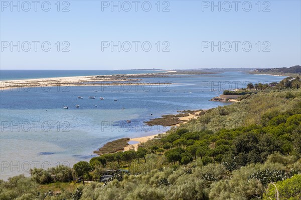 Coastal wooded landscape of pristine beaches and lagoon behind offshore sandbar, Cacela Velha, Vila Real de Santo Antonio, Algarve, Portugal, Southern Europe, Ria Formosa Natural Park, Europe