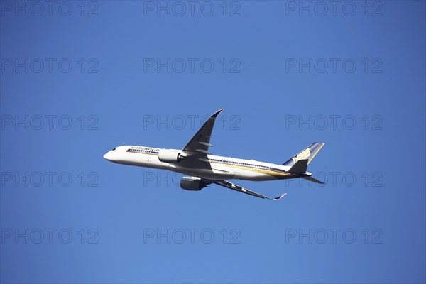 A Singapore Airlines passenger aircraft takes off from Frankfurt Airport