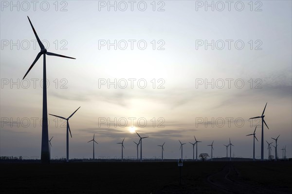 Windmills in a wind farm, Nauen, 03/03/2021