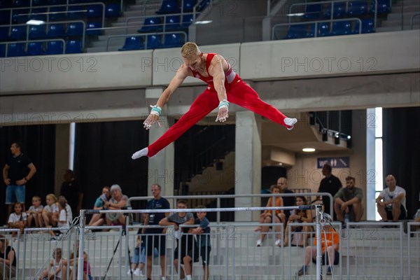 Heidelberg, 9 September 2023: Men's World Cup qualification in conjunction with a national competition against Israel. Lucas Kochan performing his routine on the high bar