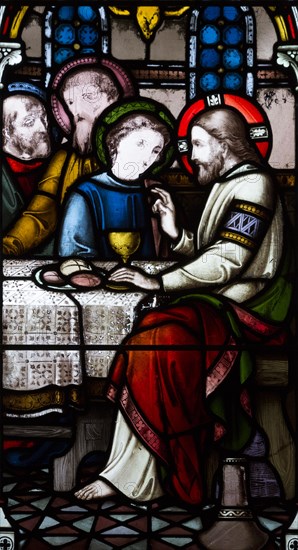 Stained glass window church of Saint John the Baptist, Butley, Suffolk, England, UK circa 1869 Jesus Christ and Disciples at the Last Supper