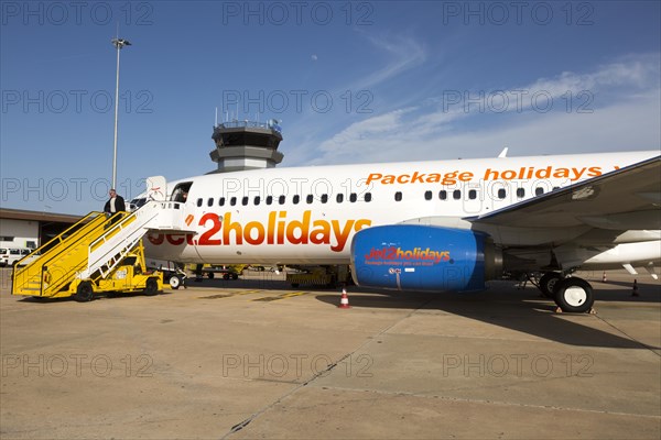 Jet2 package holiday plane passengers disembarking at the airport Faro, Algarve, Portugal, Europe