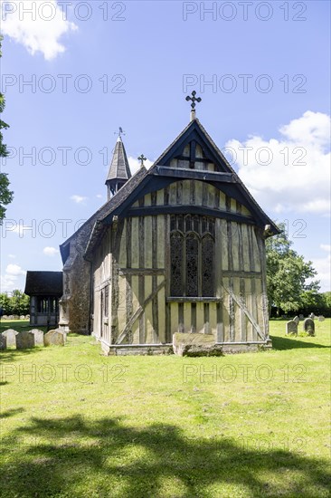 Village parish church of All Saints, Crowfield, Suffolk, England, UK with wooden timber framed chancel