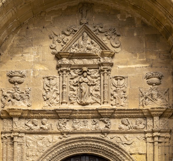 Detail of stonework carvings above doorway to church of Santa Maria de la Asuncion, Briones, La Rioja Alta, Spain, Europe