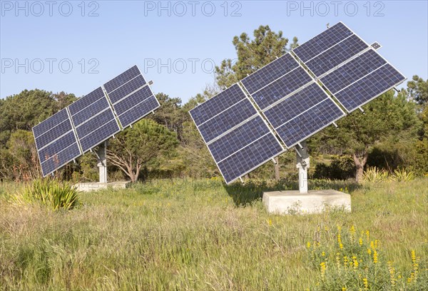 Solar panel array in rural location of field in countryside providing domestic energy near village of Rogil, Algarve district, Portugal, southern Europe, Europe