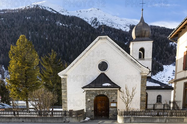 Church, mountain peak, snow, winter, Guarda, Engadin, Grisons, Switzerland, Europe