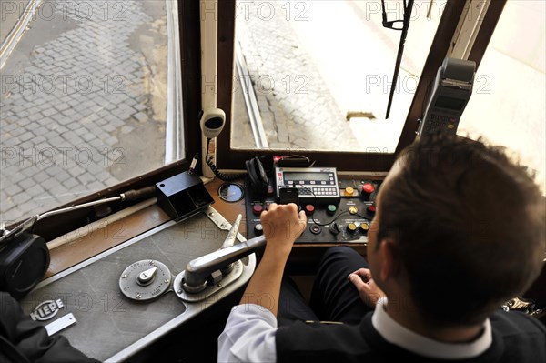 Driver, tram line 28, Alfama neighbourhood, Lisbon, Lisboa, Portugal, Europe