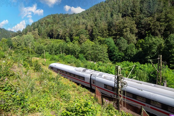 ICE (Intercity Express) in the Palatinate Forest. The train is on its way from Frankfurt to Paris. With intermediate stops in Mannheim, Kaiserslautern and Saarbruecken, it takes six hours to reach the French capital