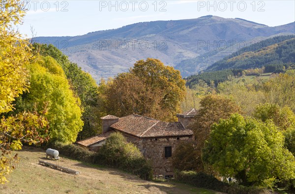 Autumnal countryside landscape view of mountains, Nuestra Senora de Tres Fuentes church, Valganon, La Rioja, Spain, Europe
