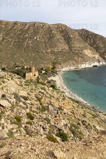 Castle, buildings and beach Cala de San Pedro, Cabo de Gata Natural Park, Nijar, Almeria, Spain, Europe