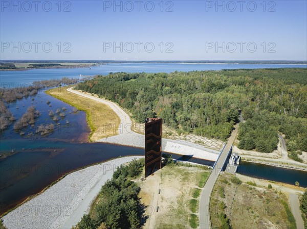 The 30 metre high landmark of the Lusatian Lakeland, the so-called Rusty Nail, was built at the mouth of Lake Sedlitz. It is a lookout tower made of 111 tonnes of Corten steel, with the base of a right-angled triangle with cathetus lengths of approximately twelve and eight metres. 162 steps lead to the viewing platform on the tower, Senftenberg, Brandenburg, Germany, Europe