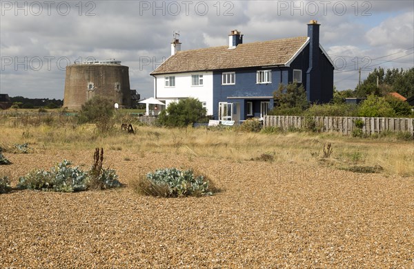 Beach house and historic Martello tower AA, Shingle Street, Suffolk, England, UK