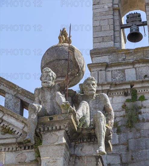 Church of Igreja de Nossa Senhora de Graca, Evora, Alto Alentejo, Portugal, southern Europe two stone Atlas-like figures sit on each corner nicknamed by locals the 'children of Grace', Europe