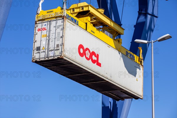 An OOCL Orient Overseas Container Line container is loaded in the port of Mannheim, Germany. Supply bottlenecks and a sharp rise in container prices are currently affecting global trade