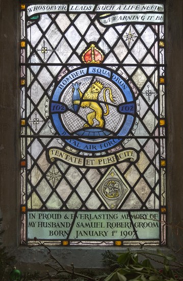 Church of Saint Mary, Chediston, Suffolk, England, UK stained glass window detail of 102 Bomber Squadron by Margaret Edith Aldrich Rope 1947