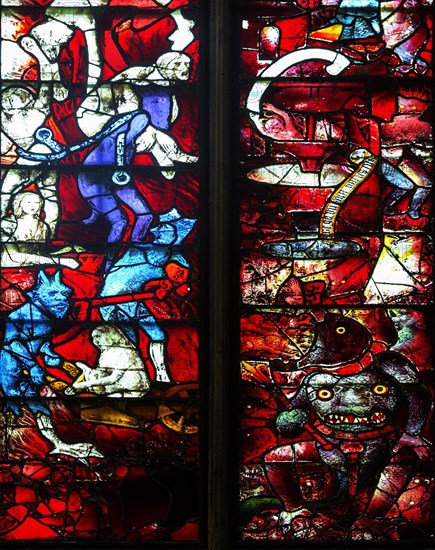 Ixteenth century stained glass windows inside church of Saint Mary, Fairford, Gloucestershire, England, UK, window 15 Rising from the dead for The Last Judgement