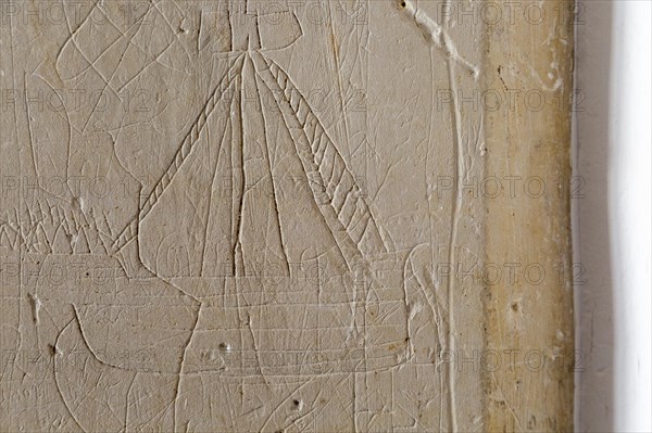 Village parish church Parham, Suffolk, England, UK ship carved graffiti in stone 14th -15th century