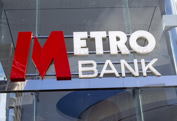 Signs on Metro Bank building, Regent Street, Swindon, Wiltshire, England, UK