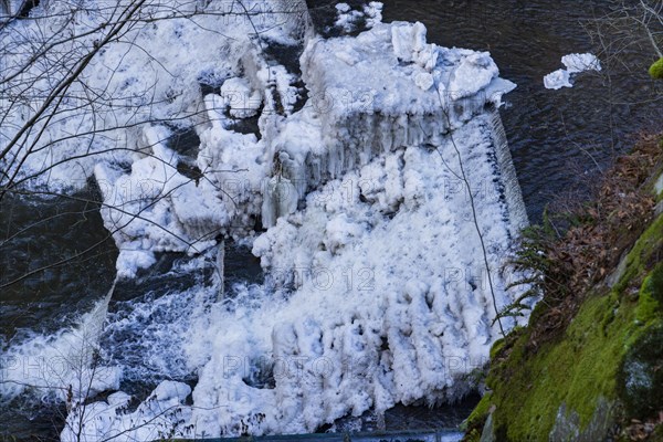 The Niezelgrund hydroelectric power plant power station is a listed small hydroelectric power station in Saxony and is located between Porschendorf and Lohmen on the Wesenitz. In severe frost, the site is transformed into a bizarre ice landscape, Lohmen, Saxony, Germany, Europe