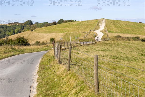 Road and track along top of chalk scarp view to Combe Gibbet, Inkpen Hill, Berkshire, England, UK