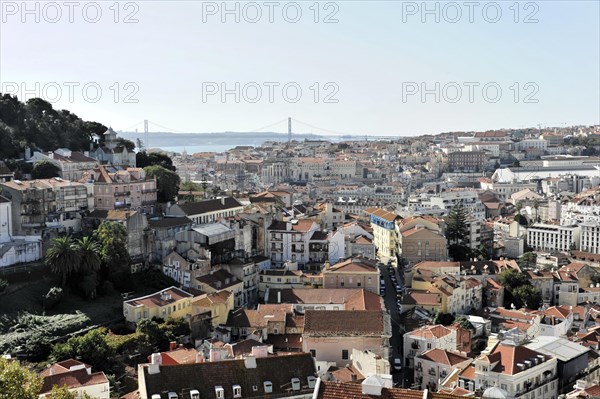 View of Lisbon, famous view from the Miradouro da Senhora do Monte tourist viewpoint of Alfama and Mauraria old town district, 25 April Bridge, Lisbon, Portugal, Europe