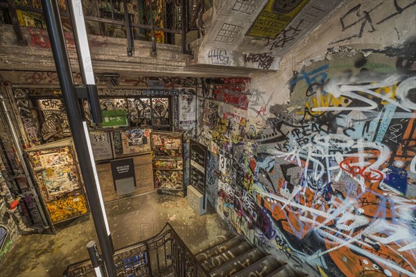 Graffiti in the stairwell of the former Kunsthaus Tacheles, now Museum Fotografiska, Am Tacheles neighbourhood, Oranienburger Strasse, Mitte, Berlin, Germany, Europe