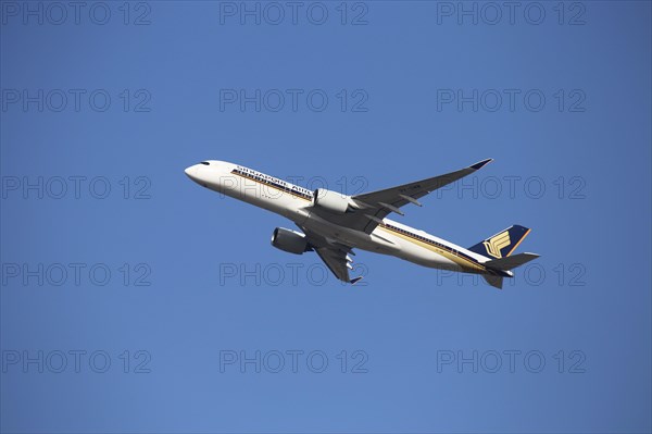 A Singapore Airlines passenger aircraft takes off from Frankfurt Airport