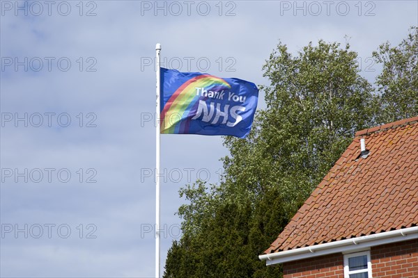 Thank You NHS flag flying in breeze, UK during 2020 Coronavirus Covid-19 crisis