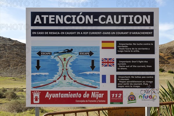 Beach sign caution auto swimmers about danger of rip current, Cabo de Gata natural park, Almeria, Spain, Europe