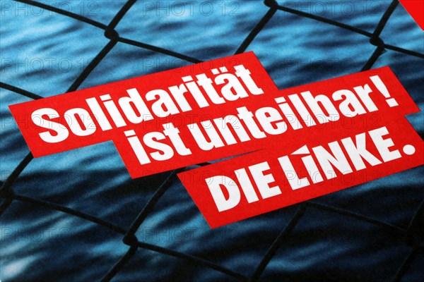 Symbolic image Die Linke: Flyer with the slogan Solidarity is indivisible