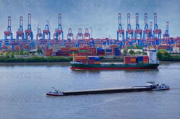 Cargo ship for containers in Hamburg harbour, behind it crane facilities, Hanseatic City of Hamburg, Hamburg, Germany, Europe