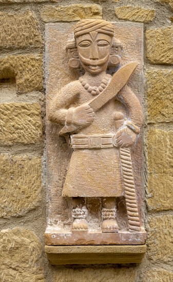 Stone carving sculpture mounted on wall in village of San Vicente de la Sonsierra, La Rioja, Spain, Europe