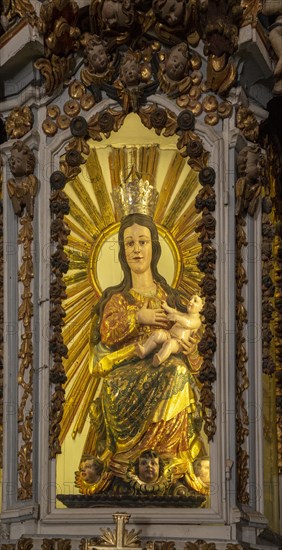 Ornately decorated statue of Blessed Virgin Mary 17th century church of Igreja de Santiago, Tavira, Algarve, Portugal, Southern Europe, Europe
