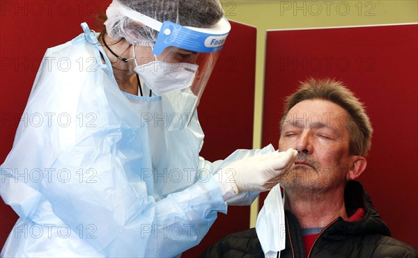 A man is tested in a Corona rapid test centre, Eberswalde, 17.03.2021