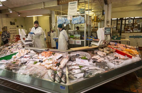Ashton's fishmonger stall inside the market in city centre of Cardiff, South Wales, UK
